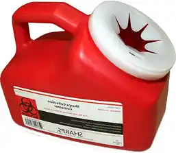 A red sharps disposal container with a white lid and a biohazard symbol.